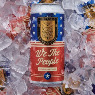 A We The People American Light Lager can chilling in a bed of ice