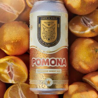 A can of Pomona Tangerine Wheat Ale surrounded by fresh tangerines